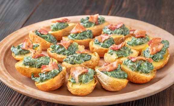 Roasted baby potatoes with creamy spinach and bacon