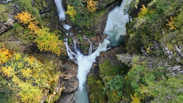 Drone shot of the Rotlech waterfall in Tirol in Austria in fall