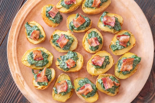 Roasted baby potatoes with creamy spinach and bacon