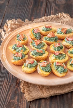Roasted baby potatoes with creamy spinach and bacon