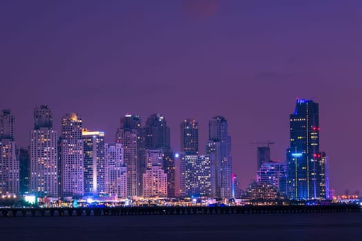 Night cityscape of Dubai city, United Arab Emirates