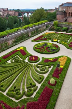 ALBI, FRANCE - AUGUST 09: Palais de la Berbie Gardens at Albi, Tarn, France on August 09, 2014. Beautiful flowerbed