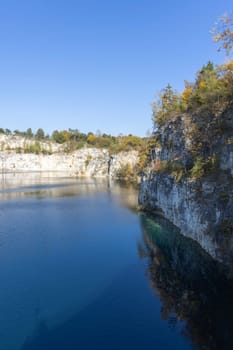 Beautiful view of Lagoon Zakrzowek, artificial water reservoir in city center, Krakow, Poland. It was created in 1992 after flooding an old limestone quarry