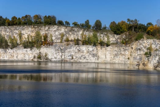 Beautiful view of Lagoon Zakrzowek, artificial water reservoir in city center, Krakow, Poland. It was created in 1992 after flooding an old limestone quarry