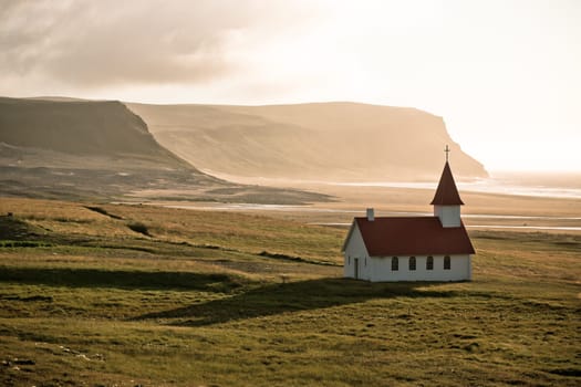 Typical Rural Icelandic Church at Sea Coastline. Horizontal shot