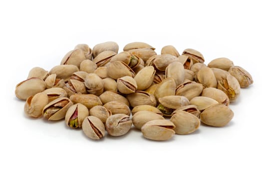A pistachio nuts in shells group isolated on white