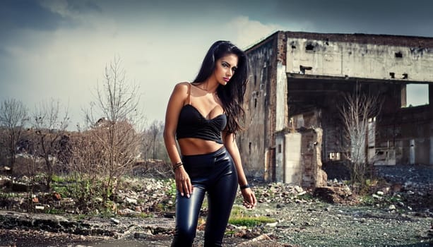 gorgeous young goth woman in ruins of abandoned nuclear power plant, AI generated image