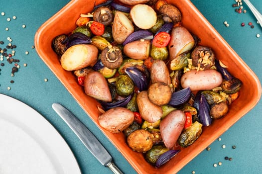 Roasted brussels sprouts and potatoes, food photography. Veggie dish, healthy eating, vegetable still life.