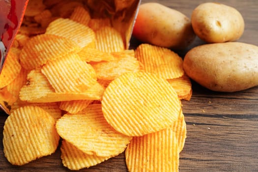 Potato chips , delicious BBQ seasoning spicy for crips, thin slice deep fried snack fast food.