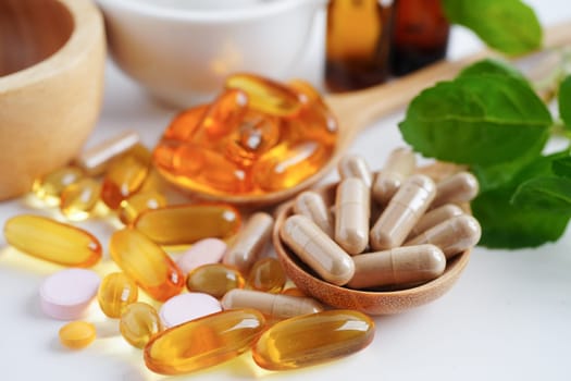 Alternative medicine herbal organic capsule with vitamin E omega 3 fish oil, mineral, drug with herbs leaf natural supplements for healthy good life.