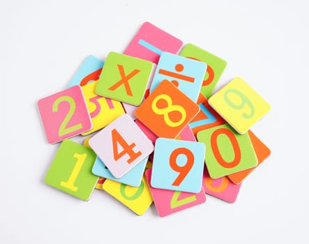 Number wood block cubes for learning Mathematic, education math concept.