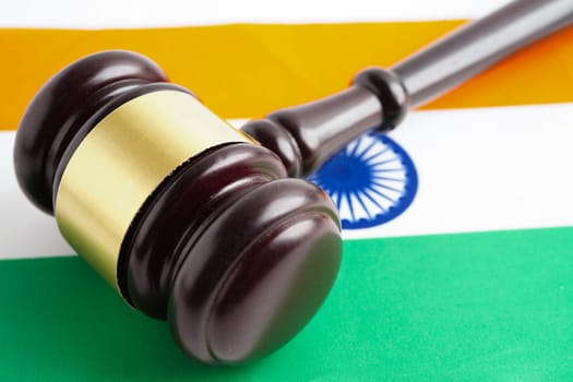 India, Legal, justice and agreement, wooden court gavel on flag.