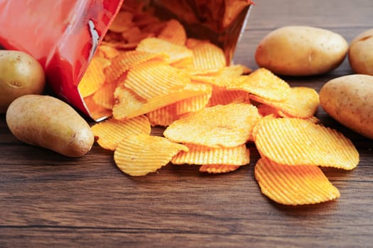 Potato chips , delicious BBQ seasoning spicy for crips, thin slice deep fried snack fast food.