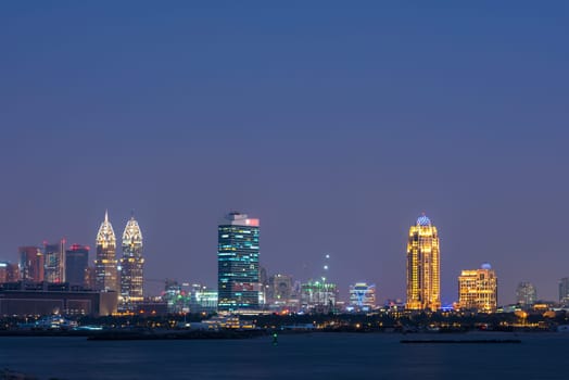 Night cityscape of Dubai city, United Arab Emirates