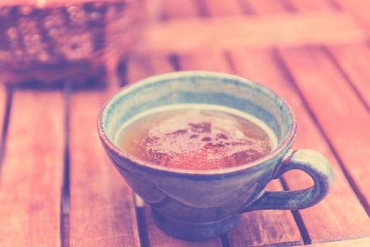 Norman apple cider in a typical ceramic cup. Filtered hot with a selective focus