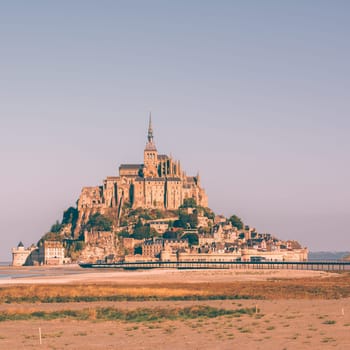 Mont Saint Michel monastery abbey on the island in Normandy, Northern France. Square toned image