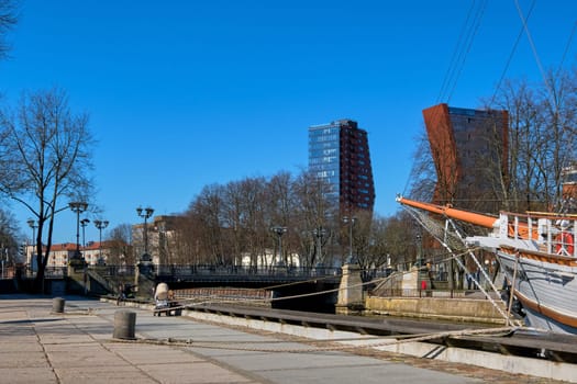 VIew of Birzos or Exchange bridge over river Dane in Klaipeda, Lithuania with a ship