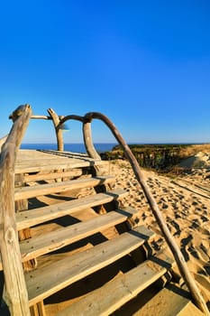 Observation point in dunes of Curonian spit, Nida, Klaipeda, Lithuania with view over sand dunes and Baltic sea. Highest point to observe both harbor and Baltic sea