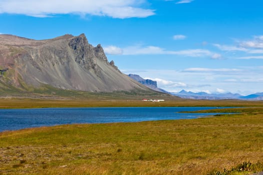 Western Icelandic mountain landscape under a blue summer sky. Snaefellsnes peninsula
