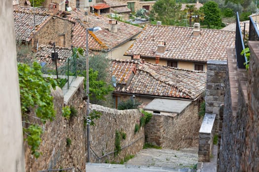 Street-stairs in small italian town. House roofs view