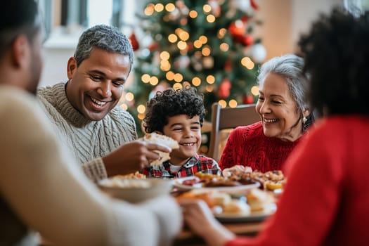 A joyful family gathers around the table, sharing a festive meal and laughter, with a beautifully decorated Christmas tree in the background.