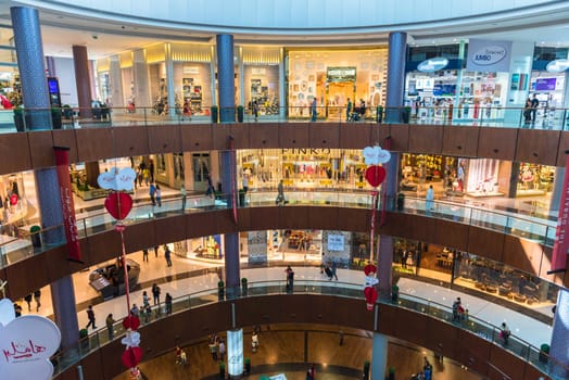 UAE, DUBAI - DECEMBER 25: people do shopping in Dubai Mall store center on December 25, 2014