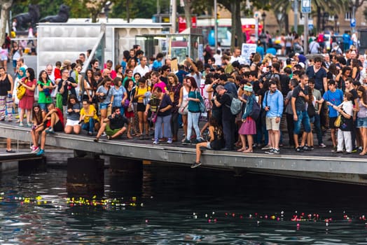 SPAIN, BARCELONA - SEPTEMBER 12: crowd of people on the pier on September 12, 2015