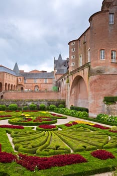ALBI, FRANCE - AUGUST 09: Palais de la Berbie Gardens at Albi, Tarn, France on August 09, 2014. Beautiful flowerbed
