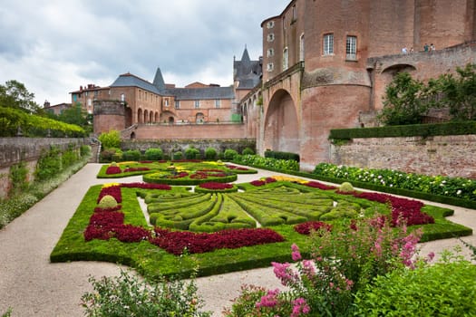 ALBI, FRANCE - AUGUST 09: Palais de la Berbie Gardens at Albi, Tarn, France on August 09, 2014. Beautiful flowerbed