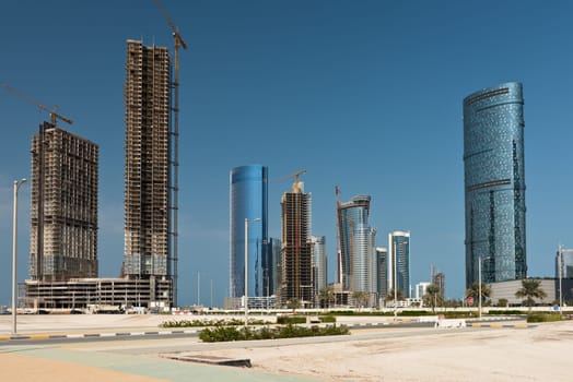 Abu Dhabi new district with skyscrapers construction. United Arab Emirates