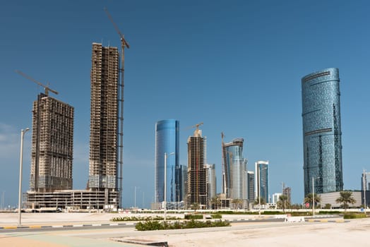 Abu Dhabi new district with skyscrapers construction. United Arab Emirates