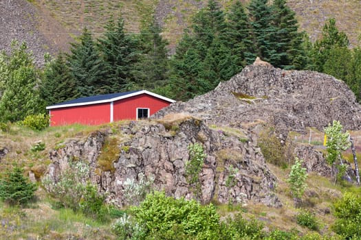 East Iceland Nature Landscape with rocks range and red house
