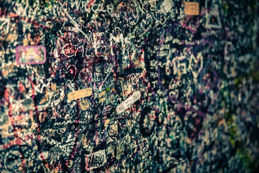 The wall full of messages from lovers in Juliet house, Verona, Italy.