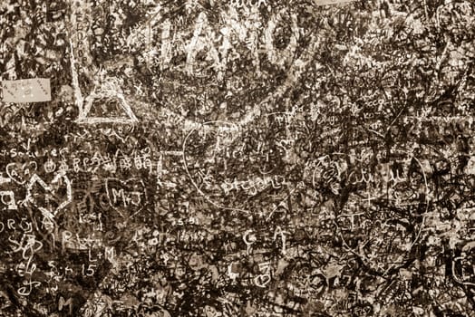 The wall full of messages from lovers in Juliet house, Verona, Italy.