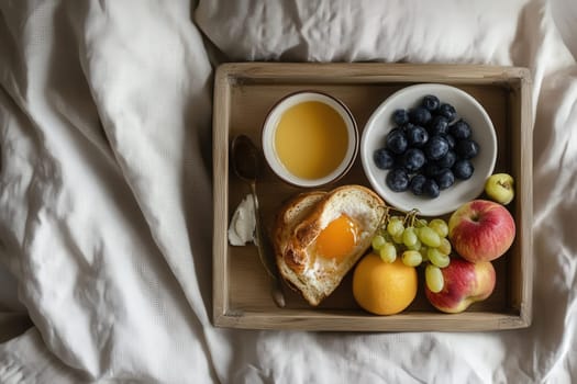 A minimalist breakfast tray rests on a bed with soft linens.