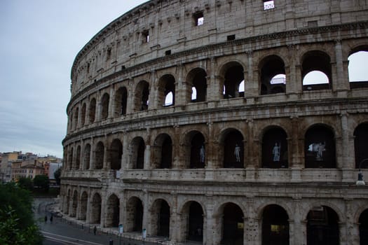 Colosseum in Rome, Italy, with cloud sky