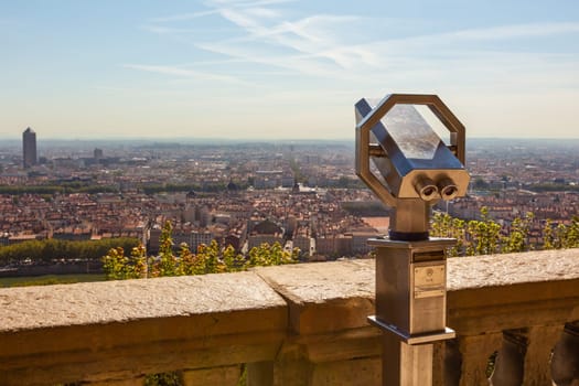 Telescope overlooking for Lyon, France, cityscape from above. Shot with a Selective focus