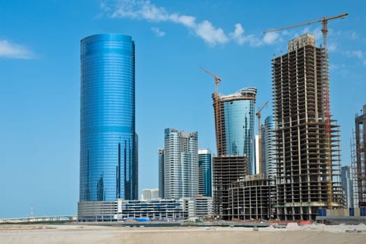 Abu Dhabi new district with skyscrapers construction. United Arab Emirates