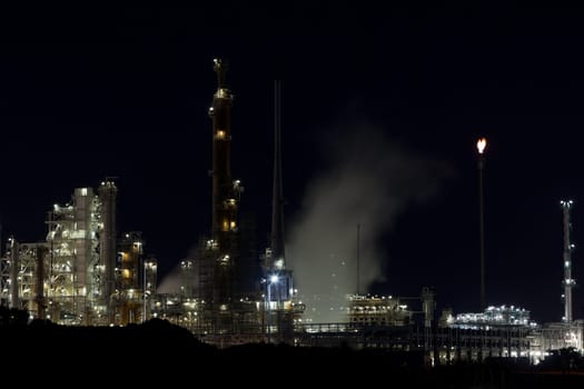 Night View of an Oil Refinery Plant. Horizontal shot