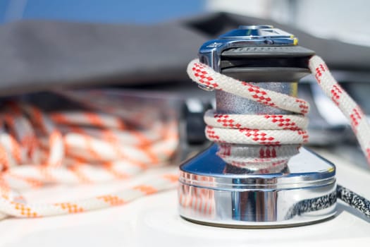 Winch with rope on sailing boat