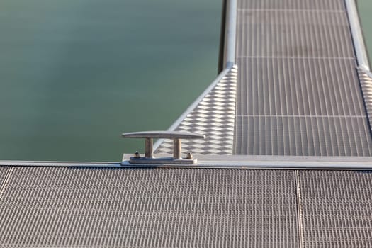 Modern Pier in the water. Shot with a selective focus