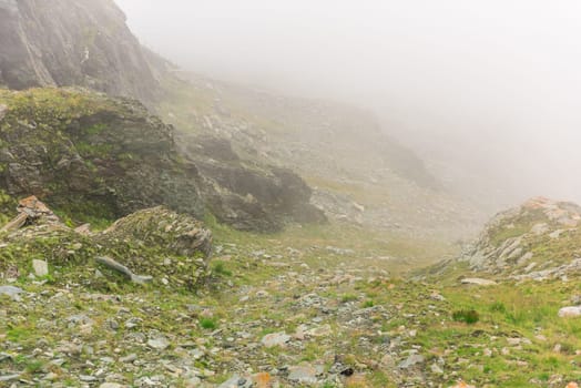 The Grossglockner high Alpine road area in overcast foggy weather