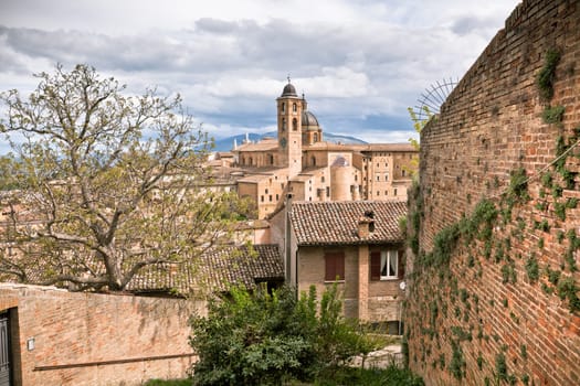 Old Urbino, Italy, cityscape at dull day. Horizontal toned and vignetted image