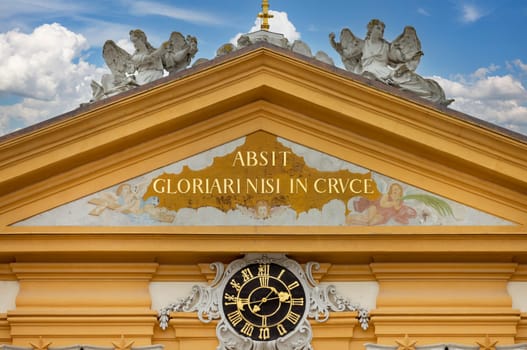 Melk, Austria - February 24, 2023: Melk Abbey on hill above town, decorative relief on facade. Monastery was founded in 11th century, today's baroque abbey was built in 18th century