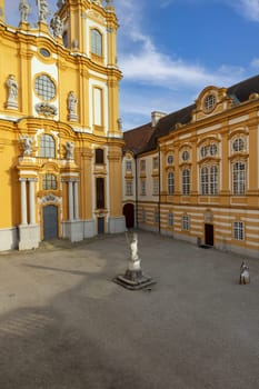 Melk, Austria - February 24, 2023: Melk Abbey, view of courtyard in front of Collegiate Church, St. Peter and St. Paul church