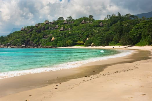 Tropical beach at Mahe island Seychelles in sunny day