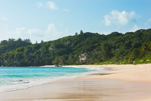 Tropical beach at Mahe island Seychelles in sunny day