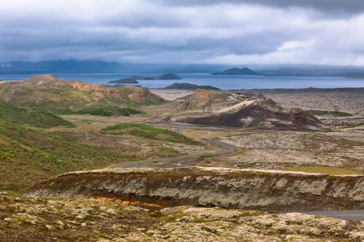 Lake and Hills in Pingvellir national park, Iceland. Overcast weather