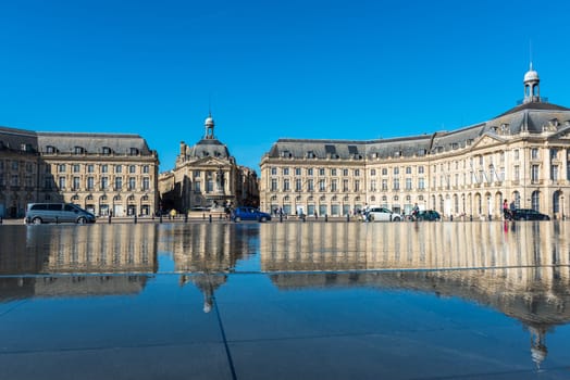 FRANCE, BORDEAUX - SEPTEMBER 20: Famous mirror fountain in front of Place de la Bourse in Bordeaux, France on September 20, 2015