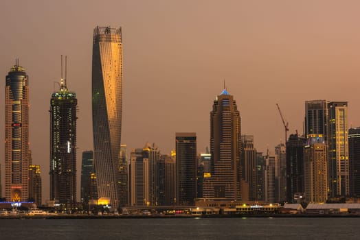 UAE, DUBAI - DECEMBER 28: Evening cityscape of Dubai city, United Arab Emirates on December 28, 2014